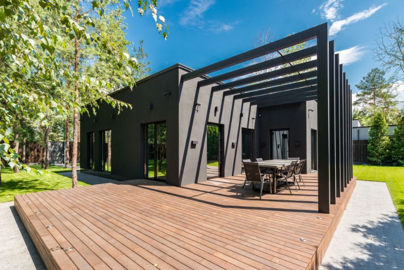 contemporary pergola attached to a modern house
